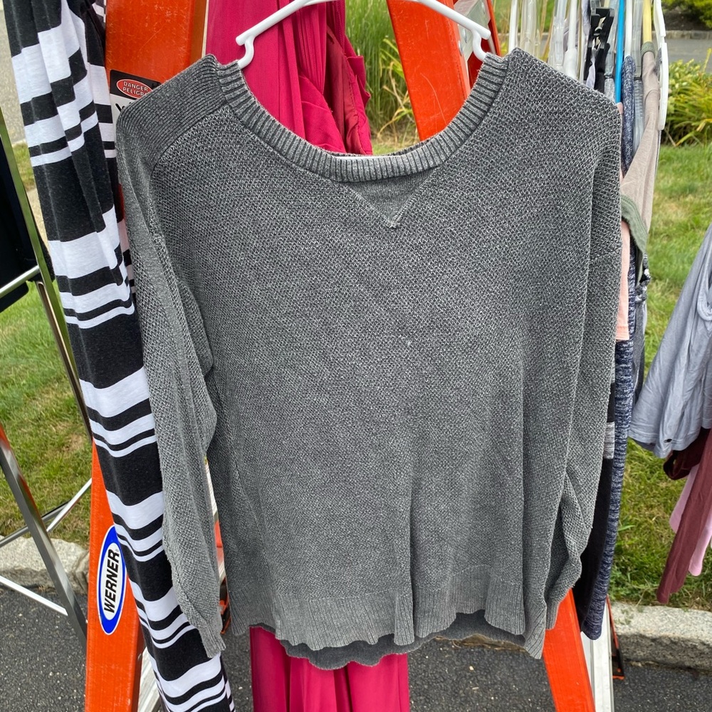 Woman’s sweater, lightly worn